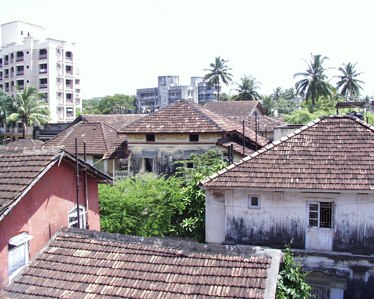 The villages gradually became congested because when there was a need for additional accommodation new houses were built on any open space in the village in a haphazard manner. Gradually tall buildings and chawls sprung up on the outskirts of a village. (A rooftop view of Ranwar Village)